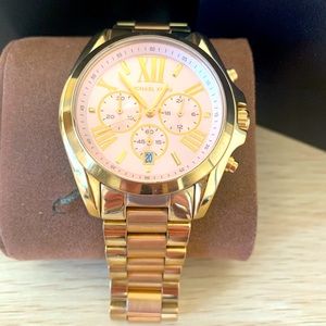 Michael Kors Rose Gold and Gold watch. Some wear. Needs new battery